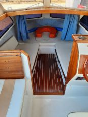 Kajütboot Mystraly Weekend 480 + 4-Takt Aussenborder Suzuki 25 PS + Trailer Wick